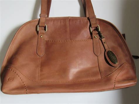 born leather purses and handbags.